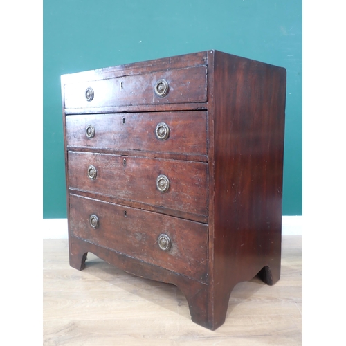 459 - A small Georgian mahogany Chest of four long graduated drawers with caddy top and bracket supports, ... 