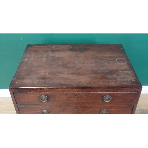 459 - A small Georgian mahogany Chest of four long graduated drawers with caddy top and bracket supports, ... 