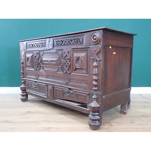 468 - A Charles II oak Mule Chest with moulded hinged cover, candle box to the interior, the front with mo... 