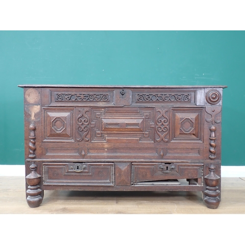 468 - A Charles II oak Mule Chest with moulded hinged cover, candle box to the interior, the front with mo... 