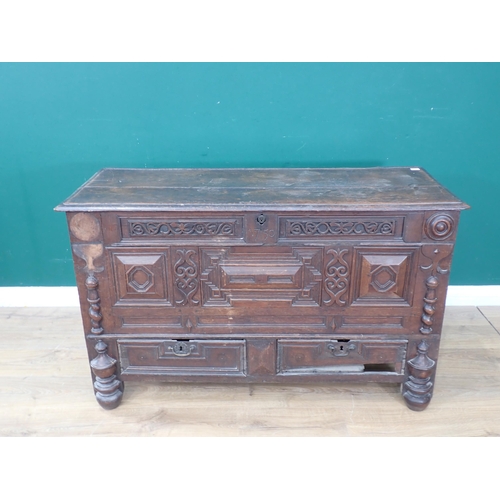 468 - A Charles II oak Mule Chest with moulded hinged cover, candle box to the interior, the front with mo... 