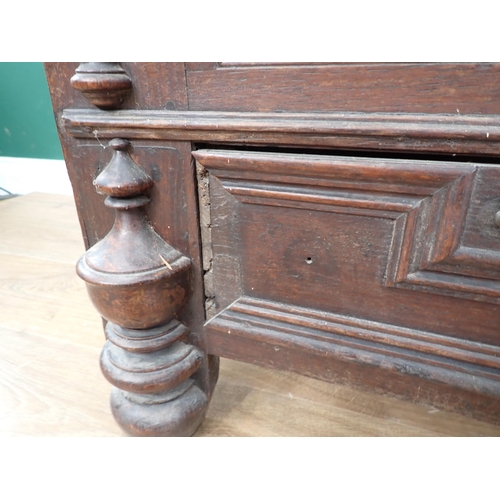 468 - A Charles II oak Mule Chest with moulded hinged cover, candle box to the interior, the front with mo... 