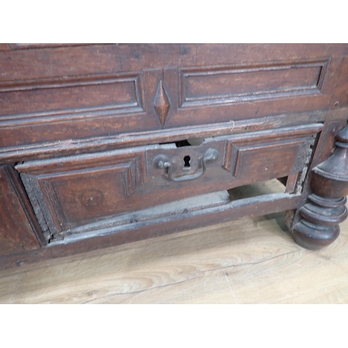 468 - A Charles II oak Mule Chest with moulded hinged cover, candle box to the interior, the front with mo... 