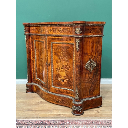 524 - A 19th Century marquetry and walnut Cabinet of serpentine form, the figured walnut top crossbanded i... 