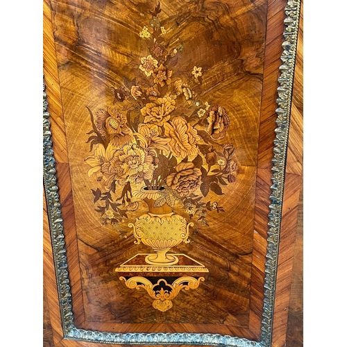 524 - A 19th Century marquetry and walnut Cabinet of serpentine form, the figured walnut top crossbanded i... 