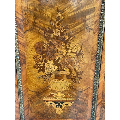 524 - A 19th Century marquetry and walnut Cabinet of serpentine form, the figured walnut top crossbanded i... 