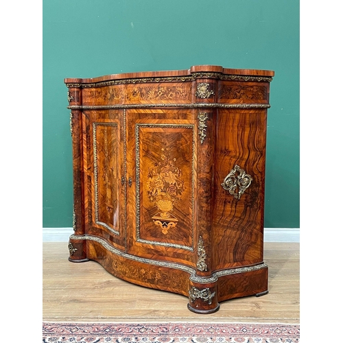 524 - A 19th Century marquetry and walnut Cabinet of serpentine form, the figured walnut top crossbanded i... 