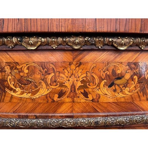 524 - A 19th Century marquetry and walnut Cabinet of serpentine form, the figured walnut top crossbanded i... 