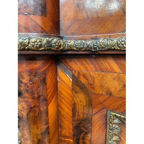 524 - A 19th Century marquetry and walnut Cabinet of serpentine form, the figured walnut top crossbanded i... 