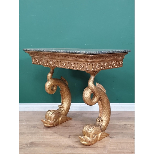 530 - An early 19th Century giltwood Console Table with green marble top, mounted upon carved dolphin supp... 