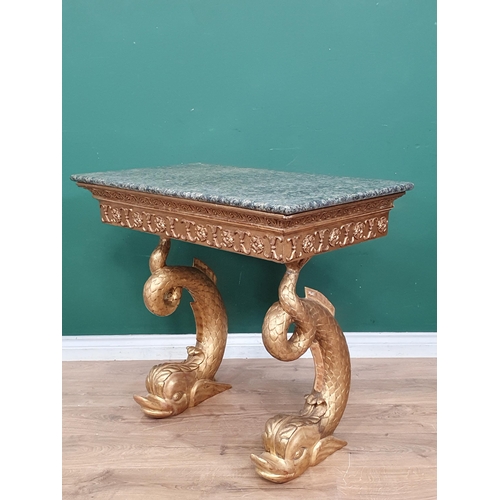 530 - An early 19th Century giltwood Console Table with green marble top, mounted upon carved dolphin supp... 