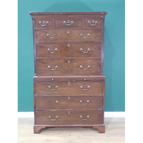 533 - A George III mahogany Chest on chest with dentil cornice above three short and six graduated long dr... 