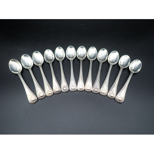 78 - One dozen Victorian silver Teaspoons, old English thread and shell pattern, engraved crests, London ... 