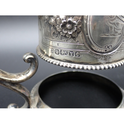 83 - A Victorian silver Claret Jug Mount, with hinged lid, floral embossing, pierced thumb piece, engrave... 