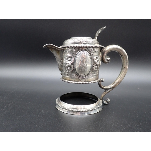 83 - A Victorian silver Claret Jug Mount, with hinged lid, floral embossing, pierced thumb piece, engrave... 