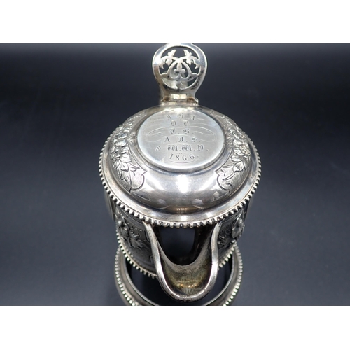 83 - A Victorian silver Claret Jug Mount, with hinged lid, floral embossing, pierced thumb piece, engrave... 