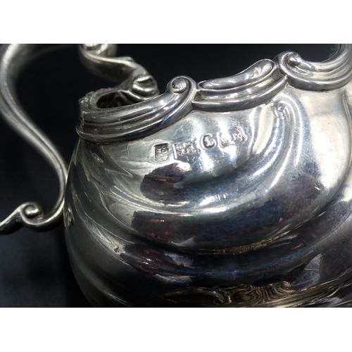 84 - An impressive pair of William IV silver Sauce Boats in the style of de Lamerie, of scallop form on p... 