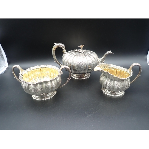 88 - A fine 19th Century silver matched three piece Tea Service of melon shape with finely chased and eng... 