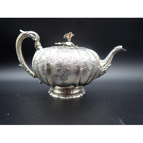 88 - A fine 19th Century silver matched three piece Tea Service of melon shape with finely chased and eng... 