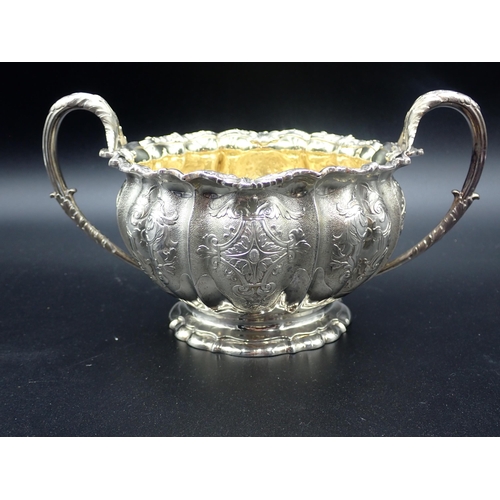 88 - A fine 19th Century silver matched three piece Tea Service of melon shape with finely chased and eng... 