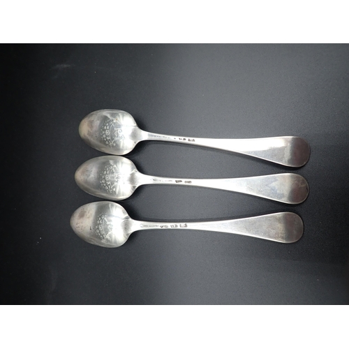 94 - Three George III bottom marked silver Table Spoons, Hanoverian pattern, the bowls with pattern backs... 