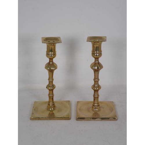 344 - Three pairs of brass Candlesticks in the 18th Century style, another 18th Century Candlestick with d... 