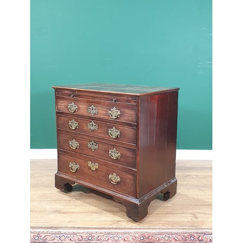 535 - An 18th Century mahogany Chest of Drawers, the moulded top above a brushing slide and four long draw... 