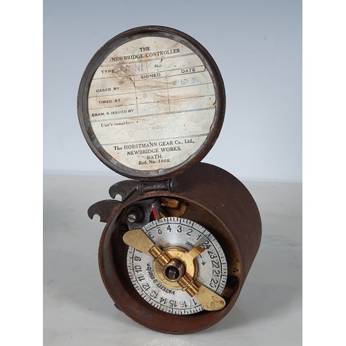 358 - A brass cased portable Watchman's Clock No 1310, the brass case stamped 