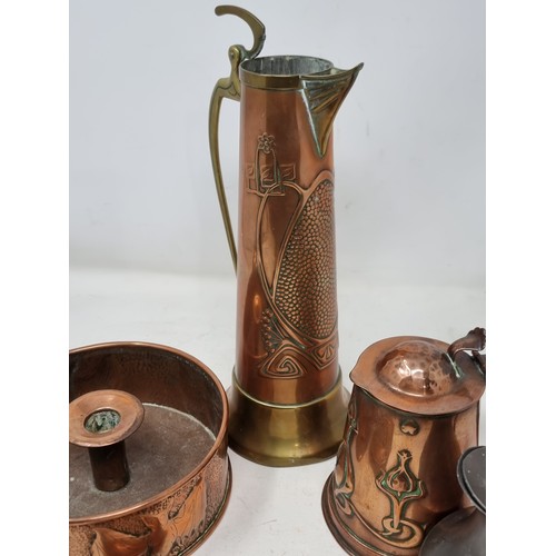 349 - An Arts and Crafts embossed copper Chamberstick, with frieze design of bats, 7in diam, a Joseph Sank... 