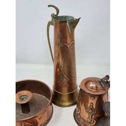 349 - An Arts and Crafts embossed copper Chamberstick, with frieze design of bats, 7in diam, a Joseph Sank... 