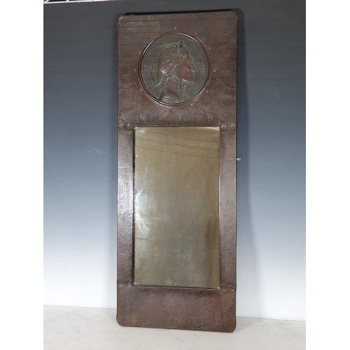 367 - An Arts & Crafts copper framed Wall Mirror, the upper section with decoration of relief bust of Dant... 