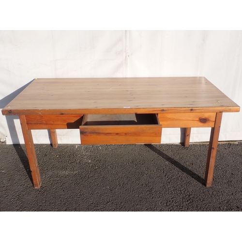 6 - A modern pine Dining Table with single fitted drawer on square cut supports, 5ft 8