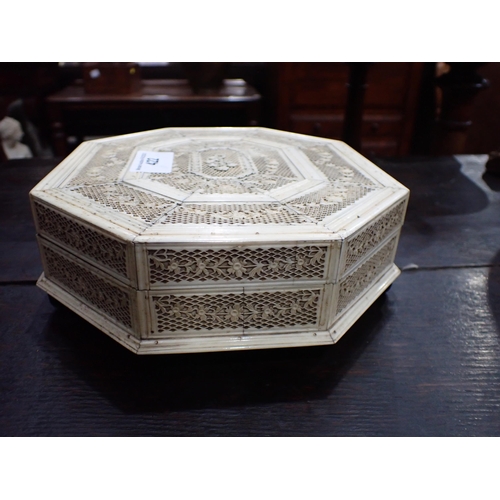 422 - A 19th Century Russian Bone Games Box with hinged octagonal cover, said to be made in Arkangel, cont... 