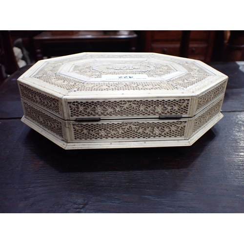 422 - A 19th Century Russian Bone Games Box with hinged octagonal cover, said to be made in Arkangel, cont... 