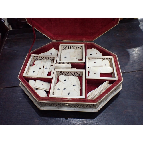 422 - A 19th Century Russian Bone Games Box with hinged octagonal cover, said to be made in Arkangel, cont... 