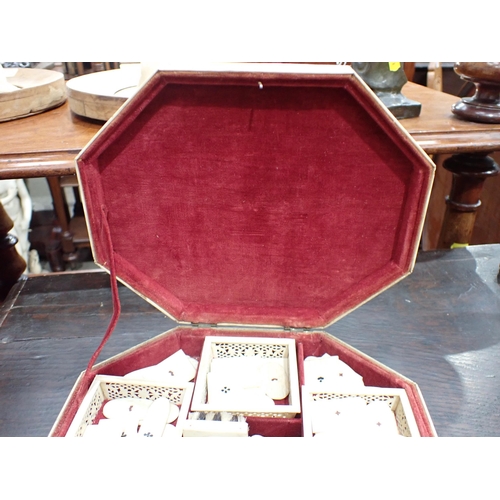 422 - A 19th Century Russian Bone Games Box with hinged octagonal cover, said to be made in Arkangel, cont... 