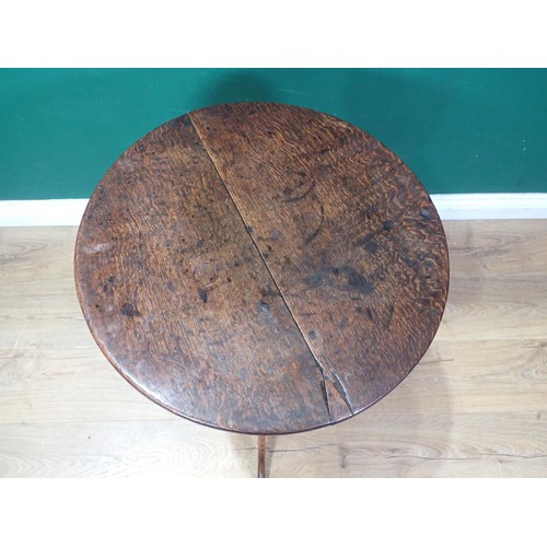 485 - An 18th Century country oak Pillar Table, the circular tilt top mounted on turned column and tripod ... 