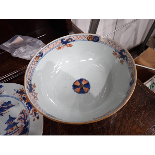 320 - Two Chinese Imari Plates painted landscape and flowering shrubs in iron red and blue, 9in, two imari... 