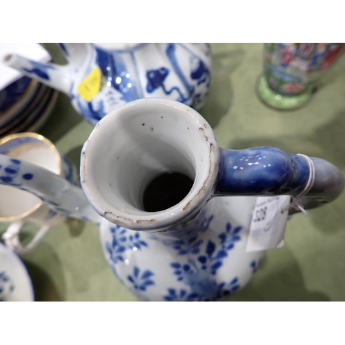 328 - An Oriental blue and white Ewer, floral painted, 6in, and a blue and white Teapot painted figures an... 