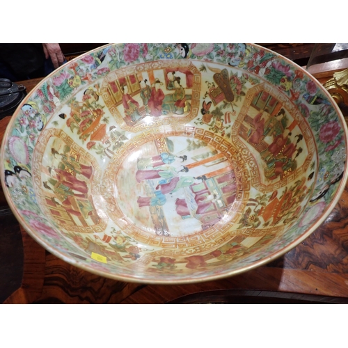 331 - A Cantonese Bowl, painted numerous figures, butterflies and flowers, 12in diam