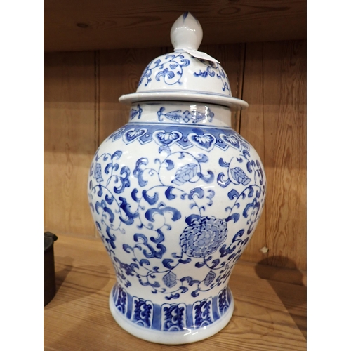 334 - A Chinese blue and white lidded baluster Jar 14in H and a Chinese cylindrical Vase with four charact... 