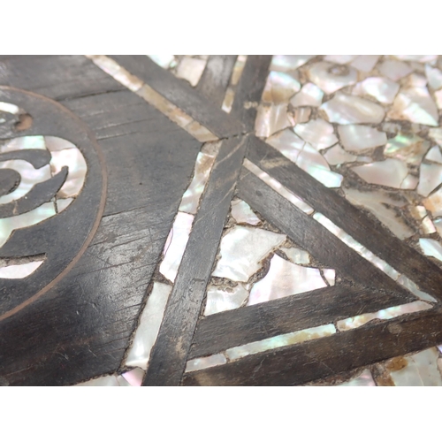 458 - A Moorish hardwood hexagonal Occasional Table, the top with star and central script motif, with all ... 