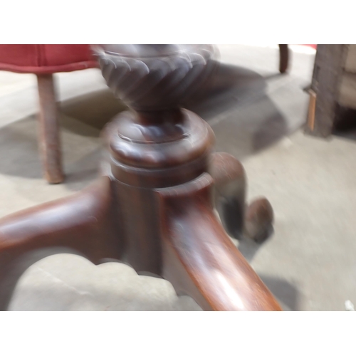 460 - A George II mahogany Pillar Table with circular top, mounted on bird cage action and turned column, ... 