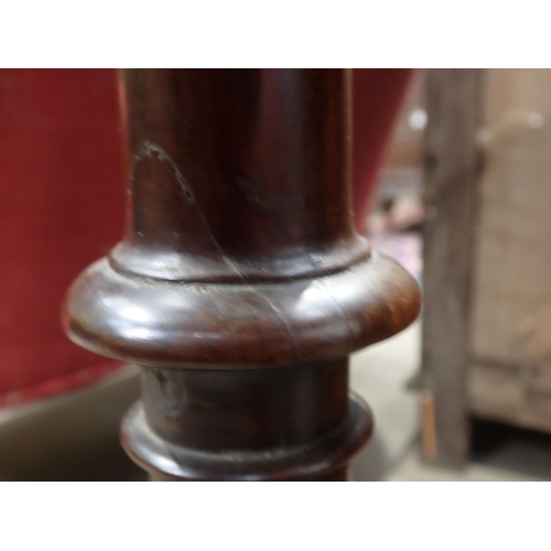 460 - A George II mahogany Pillar Table with circular top, mounted on bird cage action and turned column, ... 