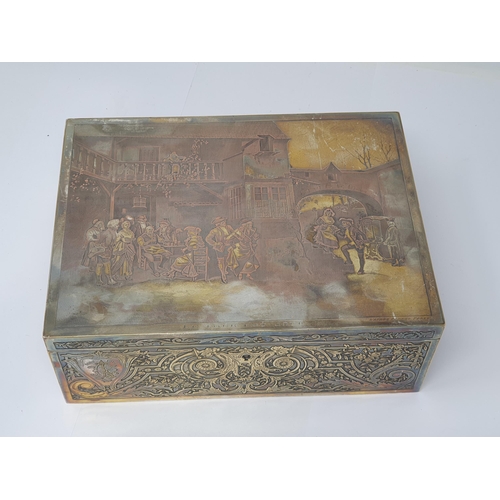 656 - A silver plated Sewing or Jewellery Box with engraved Parisian Scene to lid titled 'Le Tour est Joue... 