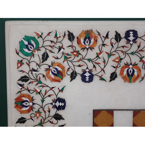 679 - A square Marble Pietra Dura Table Top with chequerboard and floral decorations, 25' x 25'.