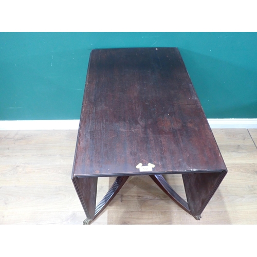 290 - A mahogany Dropleaf Dining Table on turned column, four splayed supports and brass paw caps.