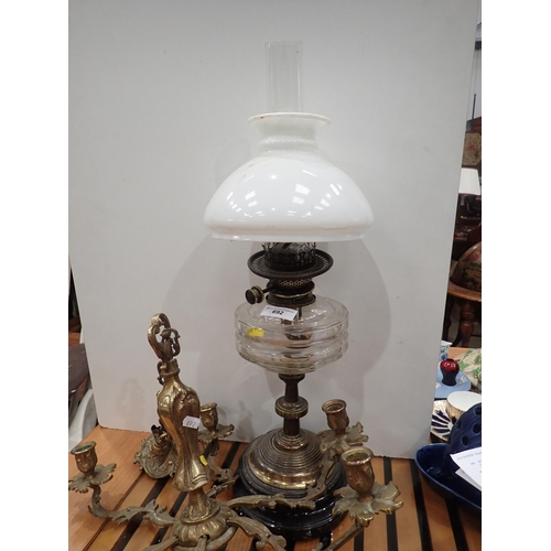 692 - A Victorian brass Oil Lamp with opaque glass shade A/F and a gilt metal six branch Electrolier