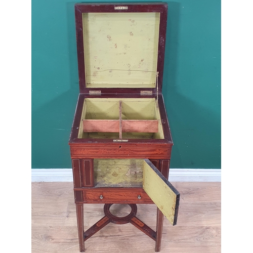 11 - A 19th Century Sheraton style mahogany and satinwood Cellarette with green painted interior and fan ... 