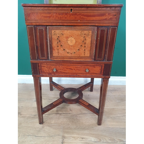 11 - A 19th Century Sheraton style mahogany and satinwood Cellarette with green painted interior and fan ... 